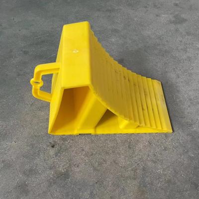 China Plastic No Bad Smell Yellow Plastic Truck Tire Cap, Wheel Chock, Wheel Block for sale