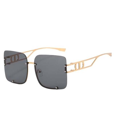 China Fashion Sunglasses Shape Metal Frameless Sunglasses Texture Sunglasses Women Retro Female Hollow Temple Sunglasses for sale