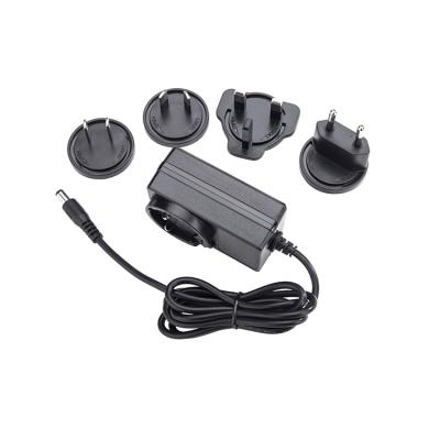 China Interchangeable Universal Socket 5v 6v 9v 12V 1a 1.5a 2a 3a DC Power Supply Power Adapter By12-1201000 for sale