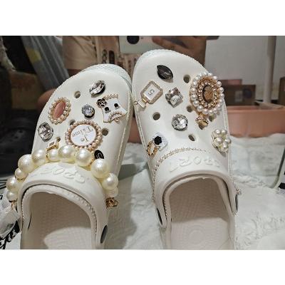 China Designer Accessories Luxury Metal Rhinestone Bling PVC Bead Custom Shoe Buckle Shoe Charm For Hole Shoes for sale