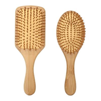 China Cushion Manufacturers Scalp Health Board Bamboo Solid Wood Curly Smooth Hair Brush Large Curly Hair Brush for sale