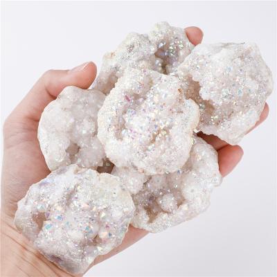 China China Wholesale Natural Sparkling Group Small Angel Aura Spirite Quartz Crystal Geode for sale