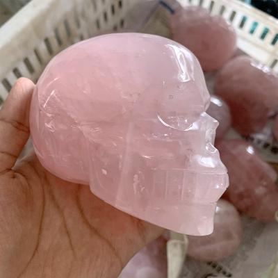 China China wholesale high quartz natural crystal rose quartz skulls for sale for sale