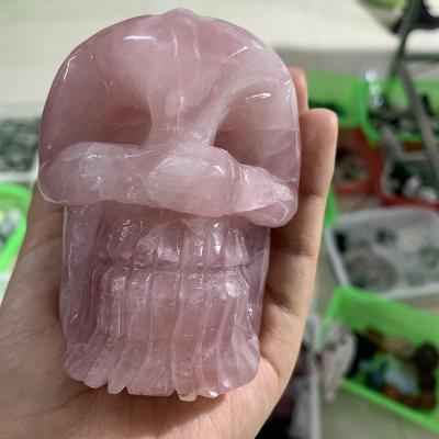 China China high quality natural quartz rose quartz beauty carve skulls carving crystal skulls for sale