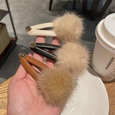 China Fashion Autumn And Winter Lady Vintage Leather Hairpin With Hairball for sale