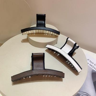 China 2022 European and American fashion style PU leather hair claw clips for lady for sale