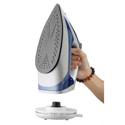 China 2021 new design Self-clean function household clothes jet self station attached portable clean cordless steam iron for sale