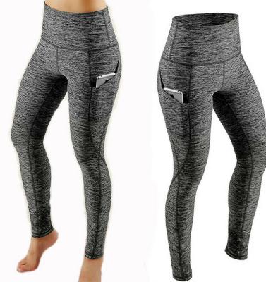 China New Breathable Yoga Fitness Polyester Spandex Leggings Women Floral High Waisted Seamless Yoga Pants With Phone Pocket for sale