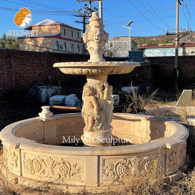 China Classic beige marble water fountain with child statue for garden decoration for sale