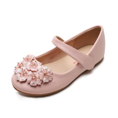 China Non-slip High Quality PU Leather Flat Low Heel Flower Decorate Solid Color Girl Princess Shoes for sale