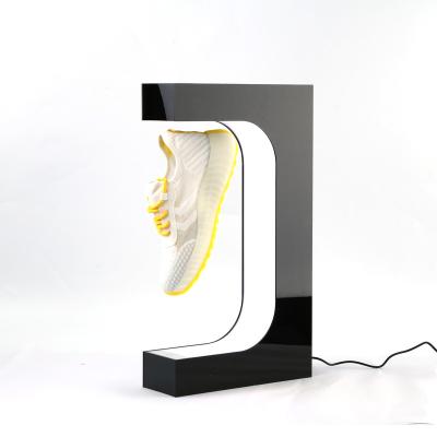 China Retail Stores Drop Shipping Levitating Shoes Stand Magnetic Levitating Sneaker Floating Display With Led Light for sale