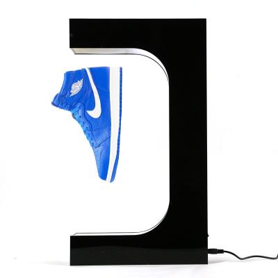 China Magnetic Floating Clear Display Levitating Retail Stores 360 Rotating Sneaker Display Men Shoes for sale