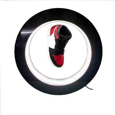 China New Design Retail Stores O Shape Spinning Magnetic Floating Shoe Display Acrylic Display Rack For Shoe Spinning Shoes Levitating Display for sale