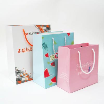 China Customized Small Brown Paper Shopping Decorative Bags Recyclable With Ribbon for sale