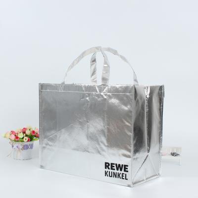 China Nonwoven Shiny Reusable Grocery Tote Handle Gift Bag Stylish Promotional Shopping Bag Eco-friendly for sale