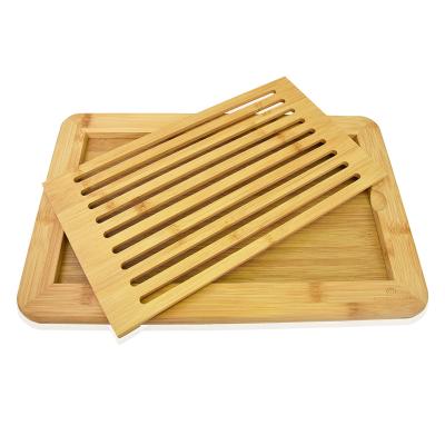 China Large Sustainable Bamboo Cutting Plate Bamboo Bread Cutting Board With Crumb Tray for sale