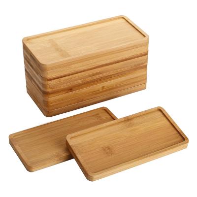 China Kitchen Sustainable Bamboo Serving Dish Tray Cheese Charcuterie Decorative Bathroom Eco-Friendly Natural Wooden Bamboo Tray for sale