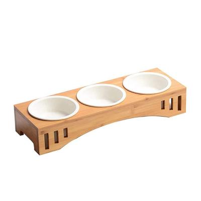 China Sustainable Pet Cat Dog Food Drinking Water Double Rolls Bamboo Wooden Dog Cat Pet Feeder Stand for sale