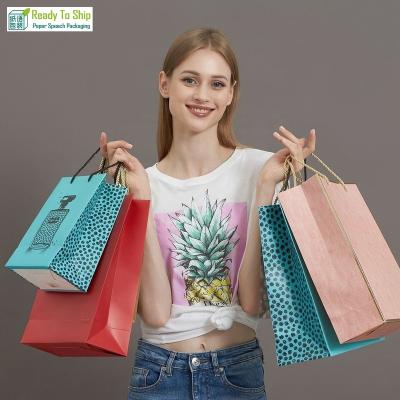 China Customized Logo Design Handmade Packaging Paper Bags Luxury Apparel Gift Bags Jewelry Gift Shopping Bags With Your Own Logo for sale