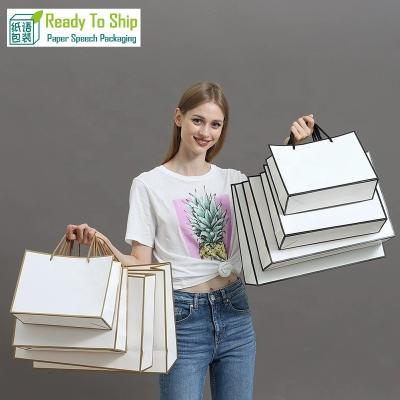 China Handmade custom logo printed euro luxury kraft paper gift bag, boutique packaging shopping bag with logos, paper bags with your own logo for sale