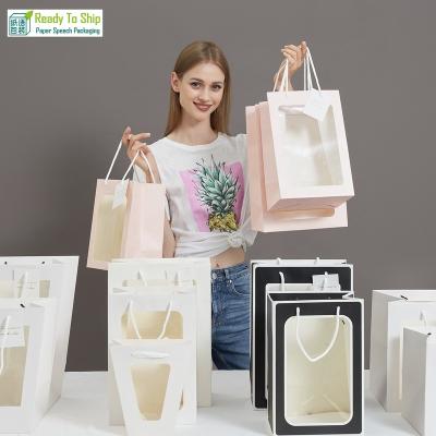 China Flower Handmade Paper Bag With Windows Doll Jewelry Gift Paper Bag With Handles Custom Paper Shopping Packaging Bags With Clear Window for sale