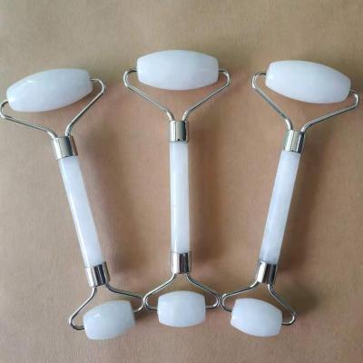 China For commercial & Anti Aging Detumescence Home Natural Crystal White Double Jade Roller Jade Head Massager for sale