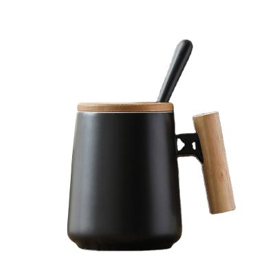 China Custom Viable Matte White Black Cup Simple Nordic Ceramic Coffee Mug With Handle Lid Wooden Spoon for sale