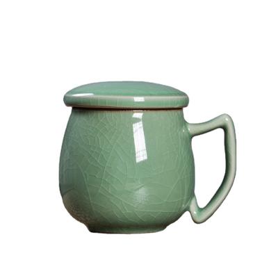 China Sustainable Longquan Celadon Tea Cup Coffee Mug Ice Slot Water Ceramic Cup With Filter Lid And Handle for sale