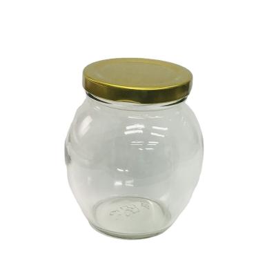 China Sale 350ml Food Industry Whole Oval Honey Jam Glass Jar Manufacture With Metal Hook Lid for sale