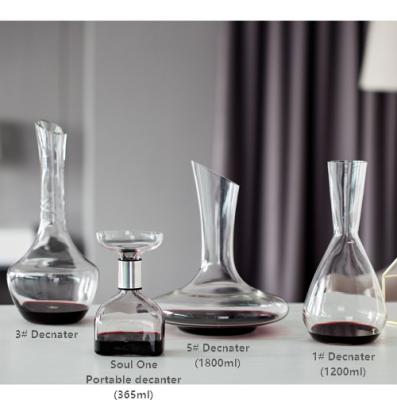 China Viable Wholesale Handmade Glass Slant Mouth 1800ml Round Red Wine Decanter for sale