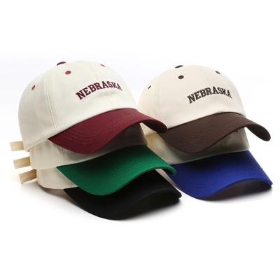 China Fashion JOINT Design Two Color Patchwork Baseball Cap Custom Embroidered Cotton Twill Sports Hat for sale