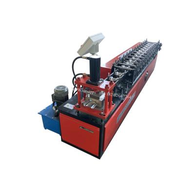 China Steel Door Shutter Door Salt Roll Forming Machine Rolling Shutter Panel Machine Supplier for sale