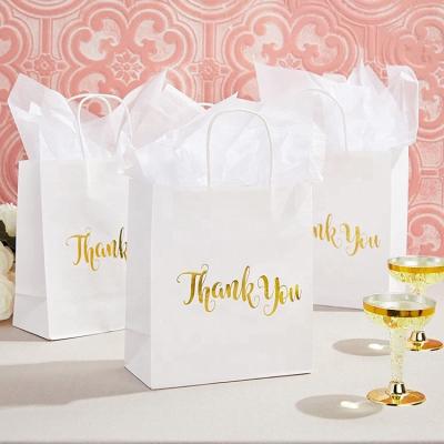 China High quality recycled materials 2022news gold foil design white thank you paper gift bags with handles and tissue paper for sale