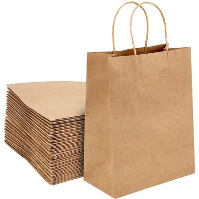 China Customized Eco Friendly Recycled Materials Free Samples Small Gift Paper Party Bags Kraft Paper Bags Brown With Handles Bulk for sale