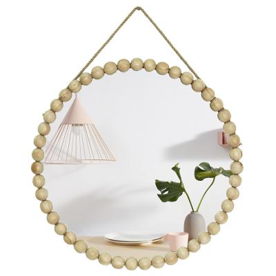 China Modern Round Wooden Wall Hanging Mirror with Wooden Bead Decoration and Rope Sash for Living Room and Home Decor for sale