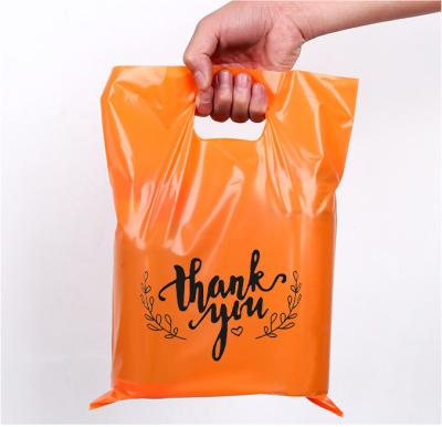 China Disposable custom printing d2w bio heavy duty retail degradable die cut plastic bags large with own logo for sale