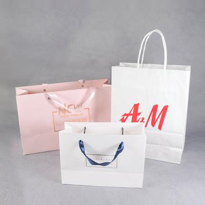 China Recycled Materials Free Design Customized Cheap White Shopping Bag From Cardboard And Kraft Paper With Your Own Logo for sale