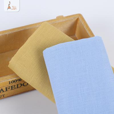 China Sustainable Eco-friendly Fabric Roll Ready Goods Plain Dyed Natural Linen Cotton Fabric For Shirt for sale