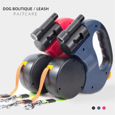 China New LED Automatic Retractable Double LED Dog Leash Pet Traction Rope Lights For Two Dogs Walking for sale