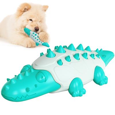 China New Stored Amazon Crocodile Dog Toothbrush Sounding Permeable Dog Food Ball The Molar Stick Dog Chew Toy for sale