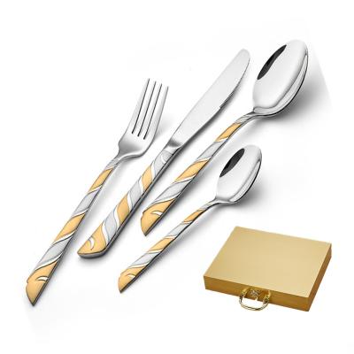 China Sustainable factory sells 24pcs satin and gold plated wholesale cutlery set with wooden case for sale