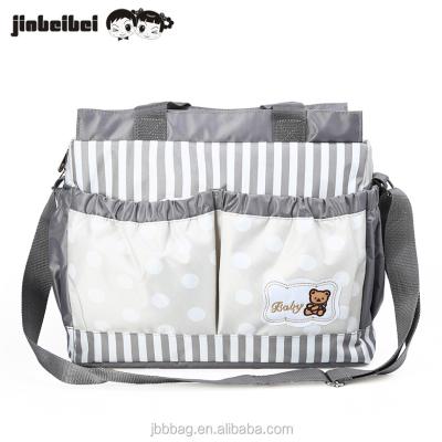 China Stylish Diaper Bag Customized Stripe And Polka Dot Stylish Mother Carry Baby Diaper Diaper Bag for sale