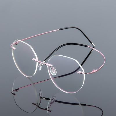 China Titanium Eyeglass Frames For Women STORE Fashion Oversized Diamond Cutting Cheap Titanium Glasses Frames Metal Eye Glass Frame Rimless For Woman for sale