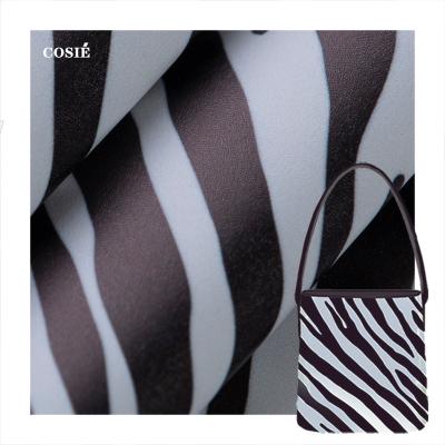 China Designer Waterproof Faux Zebra Pattern Leather Fabric Digital Printing Waterproof Leather Fabric For Tote Bags With Custom Printed Logo for sale