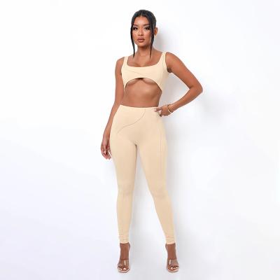 China New Design Breathable Wholesale Women Two Pieces Sports Set Solid Color Yoga Leggings And Bra Ladies Seamless Yoga Set for sale