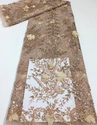 China Viable Wedding Lace Fabric 2021 Champagne Flower Embroidery Tulle Lace Fabric 3d Embroidered French Lace Fabric With Sequins for sale