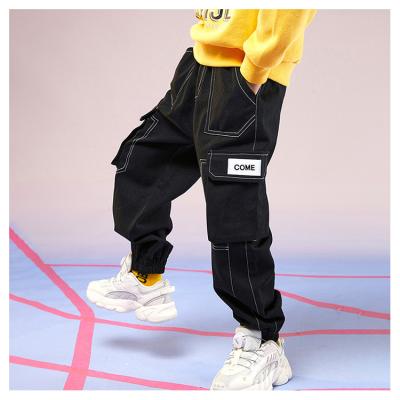 China Anti-Wrinkle Baisheng Garment Customization Boys Clothing Casual Spring Trend Boy Black Quarter Cargo Pants New With Big Pockets Kids Pants for sale