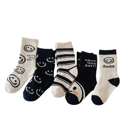 China Antibacterial Children's Socks Winter Black And White Smile Face Baby Socks Terry Socks Cotton Thickened Warm for sale