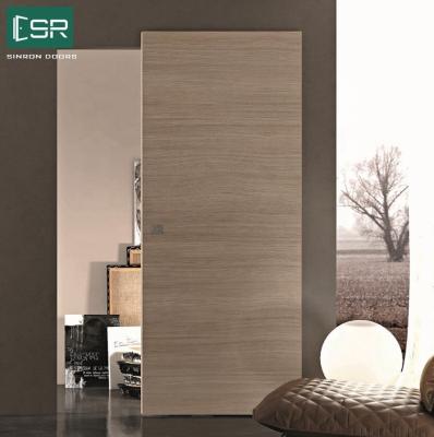 China Simple Design Modern Magic Sliding Barn Door With Track System Wall Mount Hidden Invisible Sliding Door for sale