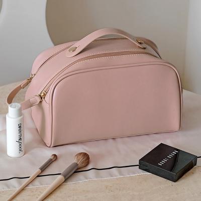 China Hot Selling Waterproof Large Capacity High Capacity Makeup Bag Lady Handbag Luxury PU Leather Tote Travel Toiletry Cosmetic Organizer for sale